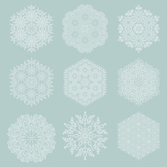 Set of snowflakes. Fine winter ornaments. Snowflakes collection. Light blue and white snowflakes for backgrounds and designs