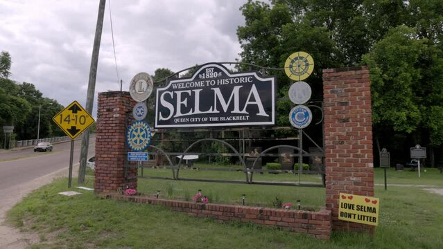 Welcome to Selma, Alabama sign with gimbal video walking forward.
