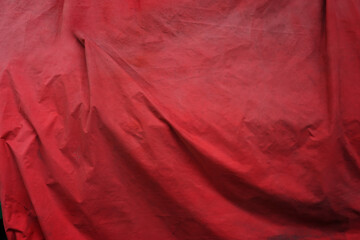 Red cloth background abstract with soft waves