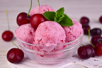 Cherry ice cream in a glass bowl.Close-up.
