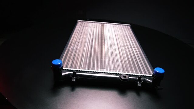 a new aluminum radiator for cooling antifreeze in the car engine