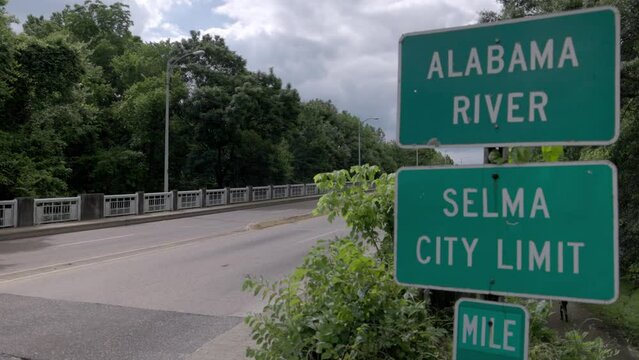 Alabama River and Selma City Limit signs in Selma, Alabama with gimbal video panning left to right.