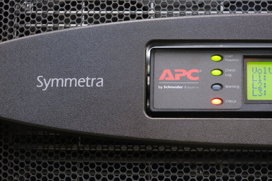 The control panel APC for the UPS module in the server room is displaying a critical error signal with a red LED light - Moscow, Russia, 10, 09, 2022