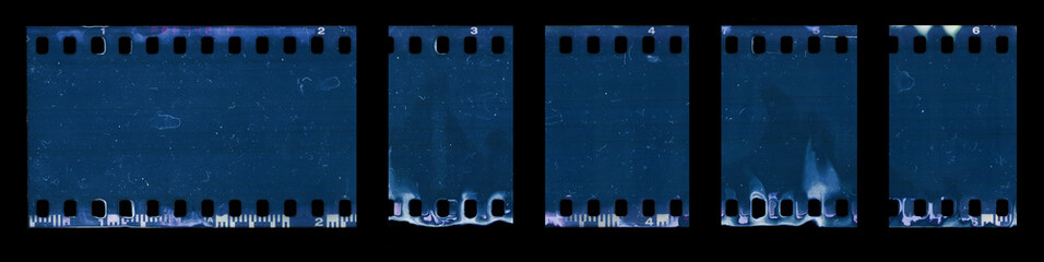 single 35mm filmstrip material pieces on black background. poster or design elements. 