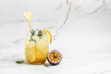 passionfruit cocktail. Tropical drink for summer party. on a light background, refreshing drink or...