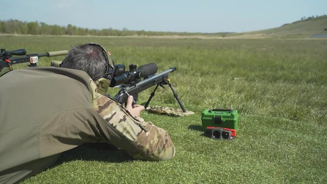 shooter performs the exercise competitions in high-precision shooting