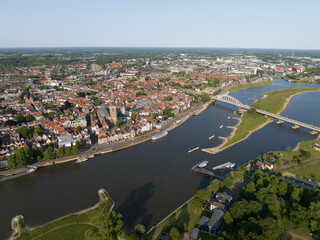 Aerial drone photo of Deventer skyline and the Ijssel river.