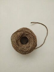 skein of twine on white background 
