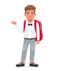 A smiling little boy stands with a red backpack on his back. A beautiful cute schoolboy child in a white shirt with a bow tie.