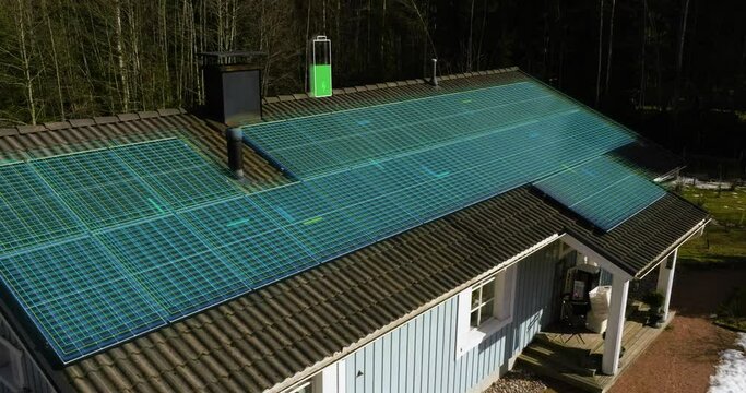 PV system collects sun light and transforms it into electricity on a private home roof