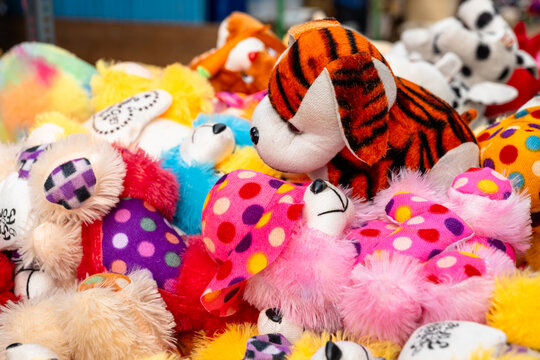 Colourful Lot of Soft Toys for Kids Displayed Stock Photo