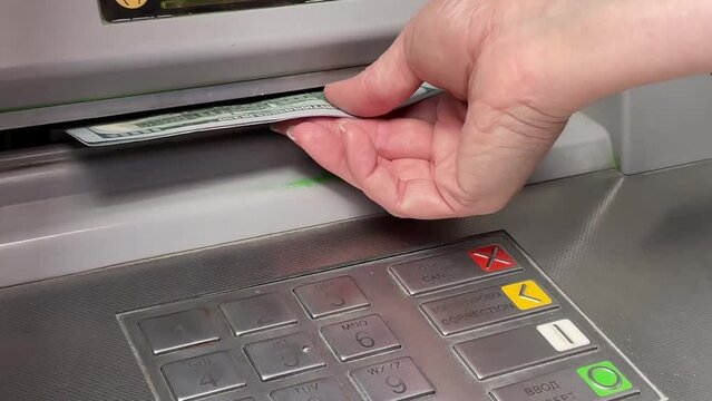 Cash withdrawal at the ATM,Payment processing with a credit card at the automated teller machine