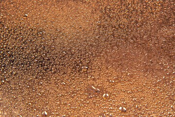 Drops of water on a colored background. Abstract texture