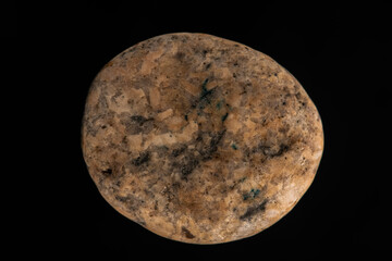 Natural stone rock isolated on black background