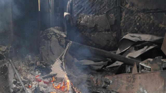Horrific footage of the war in Ukraine. The aftermath of the bombing. A house on fire