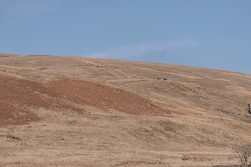 dry mountain with blue sky