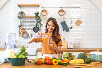 Portrait asian beauty body slim woman drinking water from a bottle while relax and feeling fresh, refresh drink, wellness, diet, healthcare, mineral at home.Healthy liquid lifestyle concept
