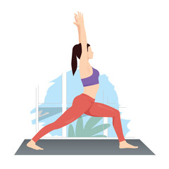 Young woman practicing Virabhadrasana, Warrior Pose yoga exercise.