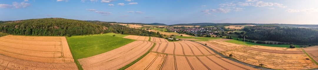 Panoramic shot from a bird's eye view of grain fields in Taunus/Germany
