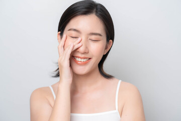 Asian woman touching her face with hands.Facial skin care concept. skin care