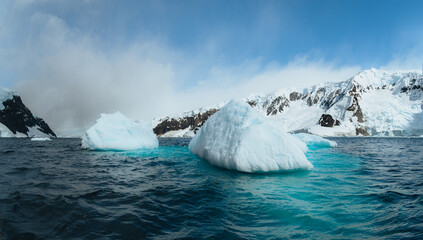 Antarctic nature landscape with icebergs in Greenland icefjord during midnight sun. Antarctica,...