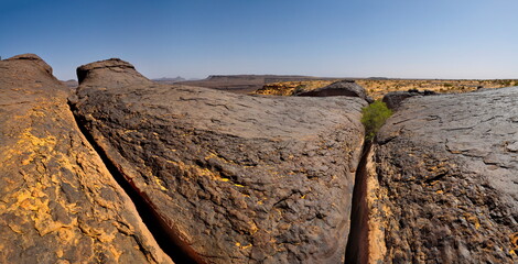 West Africa. Mauritania. Panorama of lava formations of ancient volcanoes on top of a destroyed...