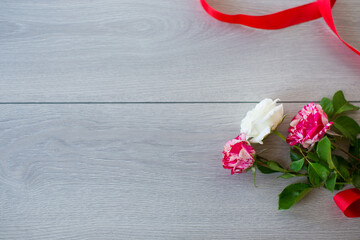 Floral background of pink, red and other roses