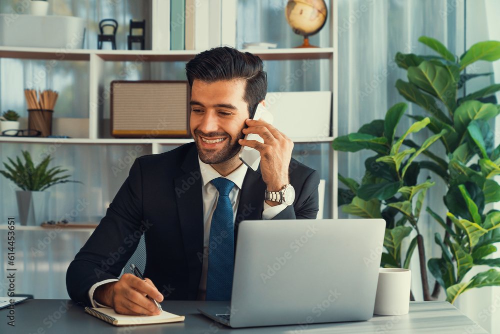Aufkleber diligent businessman busy talking on the phone call with clients while working with laptop in his of