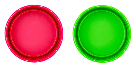 Plastic bottle caps isolated against a white background. Of green, red color.