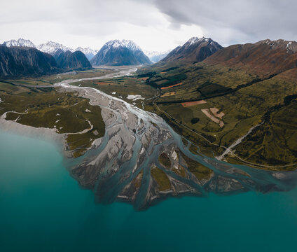 new Zealand, View of Ben Ohau range and Lake Ohau from the aerial drone view with blue lake on cloudy day. South island.