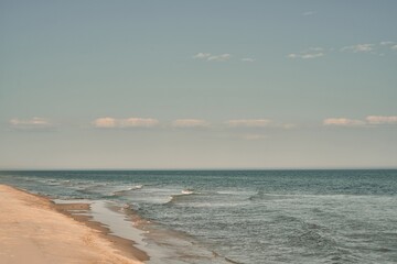 Serene Morning Bliss: Tranquil Baltic Sea Shore Awaits, Embracing the Essence of Vacation