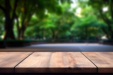 Wooden table in front of blurred nature garden park background. For product display. High quality photo