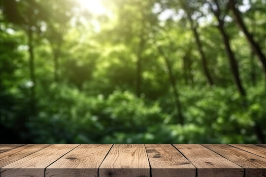 Wooden table top on blur green forest with bokeh background. High quality photo