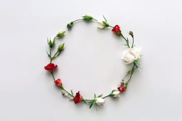 Flowers composition. Wreath made of pink rose flowers on white background. Flat lay, top view, copy space.