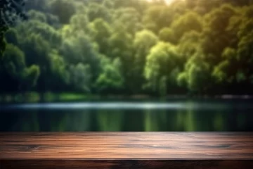 Fototapete Berge The empty wooden table top with blur background of summer lakes green forest. High quality photo