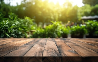 Wooden table top on blurred green nature garden house background with sunlight. High quality photo