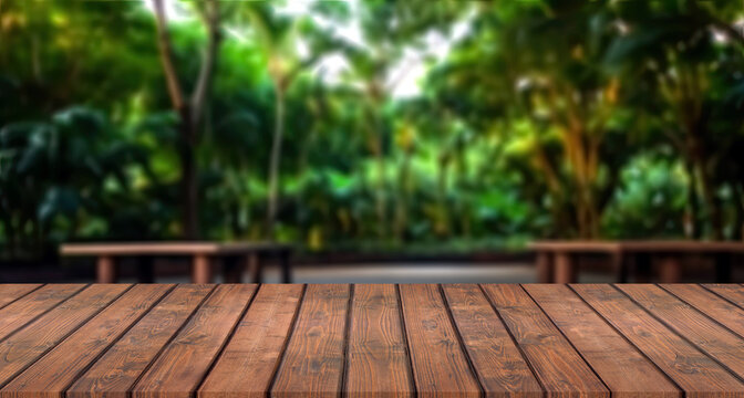 Wooden Table And Blurred Background Of The Garden With Trees. High Quality Photo