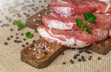 fresh raw meat on cutting board closeup
