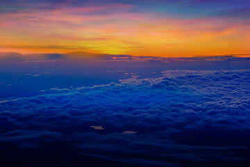 Naklejka na ściany i meble Beautiful sky above the clouds, top view from fly, aerial view of clouds and,