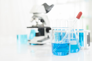 Glasswares objects and microscope in laboratory. Science and education. Scientific experiment, Researcher, Research concept