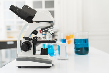 Glasswares objects and microscope in laboratory. Science and education. Scientific experiment, Researcher, Research concept