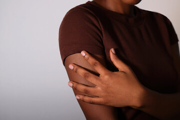 Afro american woman hands, nude manicured nails