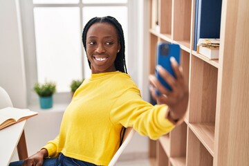African american woman smiling confident make selfie by smartphone at home