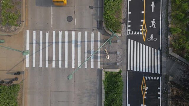 overhead view of crosswalk through West Side Highway and bike path in NYC
