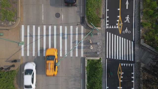 alt overhead view of crosswalk through West Side Highway and bike path in NYC