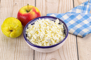 Organic cottage cheese in the bowl