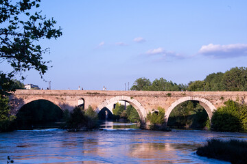 Fototapeta na wymiar Milvian Bridge at sunset, on river Tiber in Rome 