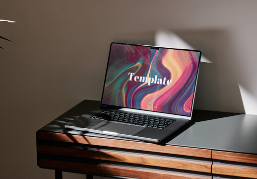 Mockup of open laptop with customizable screen
