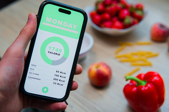 calorie counting app on smartphone screen. Getting in shape and losing weight.