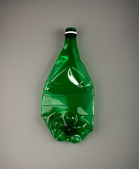 Green Empty Plastic Bottle, Crumpled Plastic Bottle, Global Pollution Concept